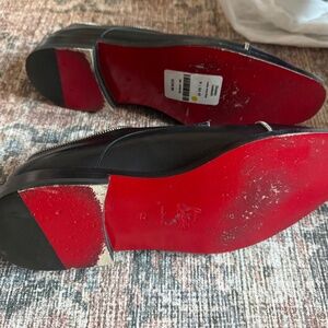 Christian Louboutin Black Leather Slip-On Loafers with Red Soles